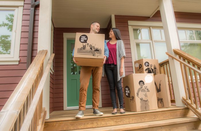 happy couple moving